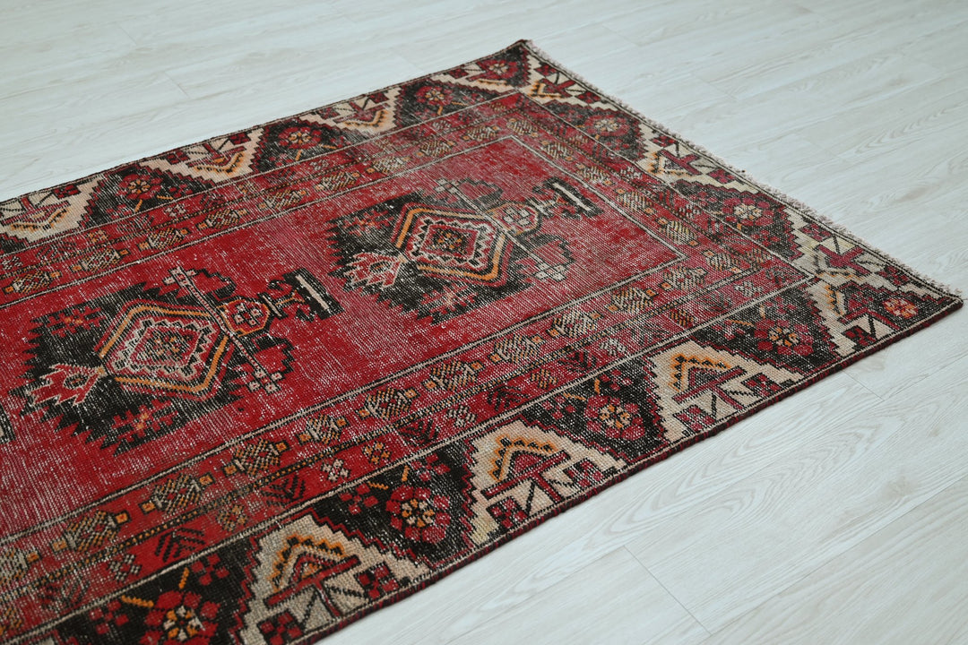 red Accent rug 3' 8" x 6' 4"