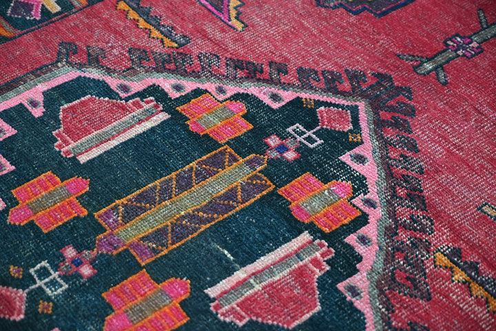 red Accent rug 4' 2" x 6' 1"
