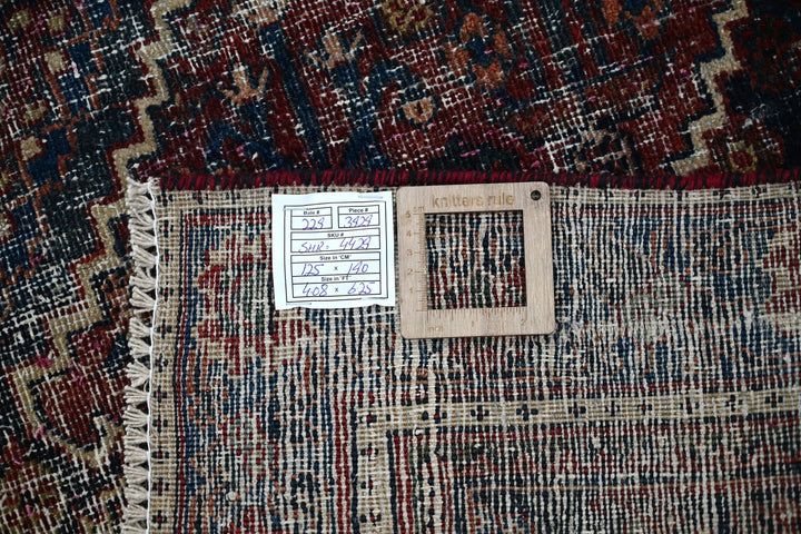 red Accent rug 4' 1" x 6' 3"
