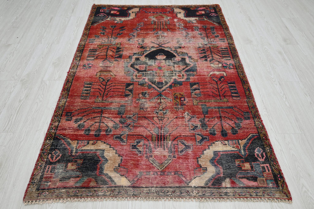 red Accent rug 3' 10" x 6' 6"