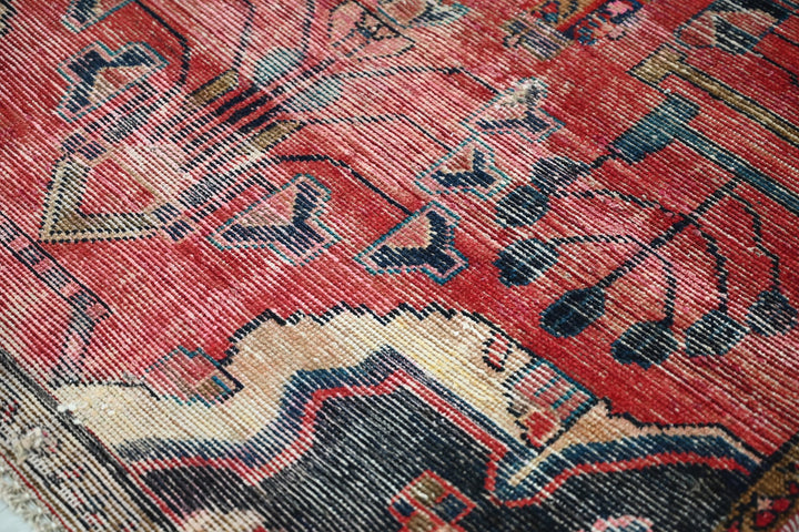 red Accent rug 3' 10" x 6' 6"