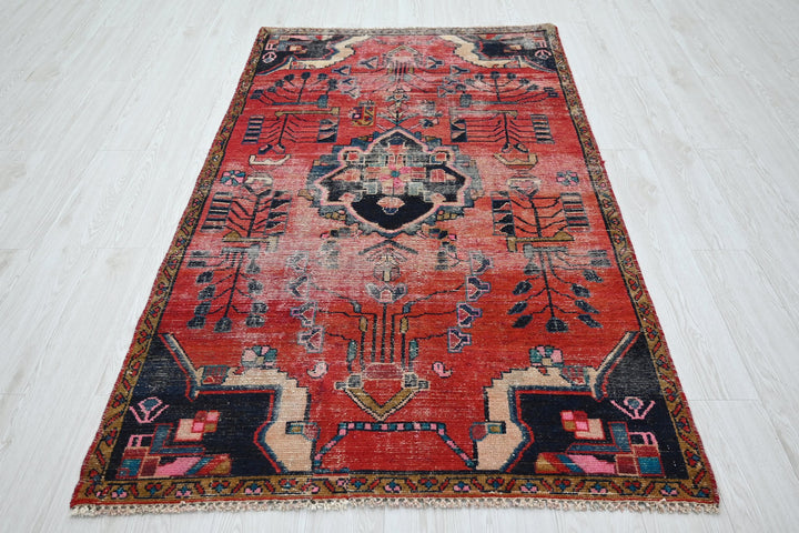 red Accent rug 3' 10" x 6' 6"