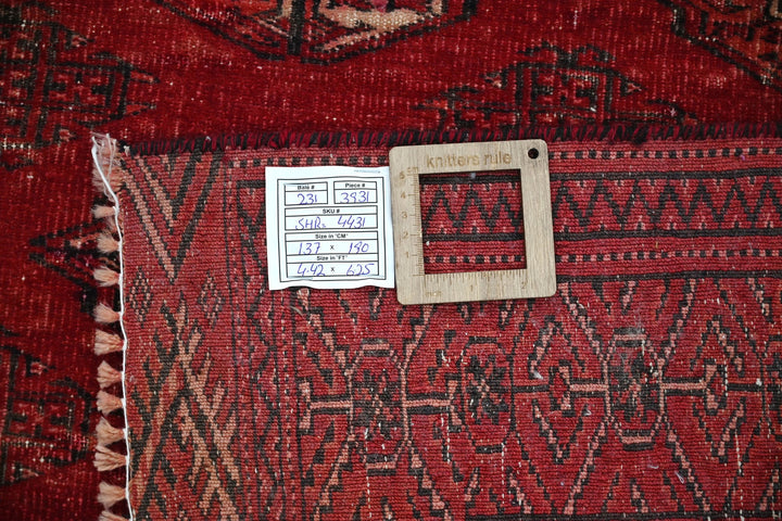 red Accent rug 4' 6" x 6' 3"