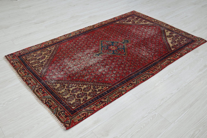 red Accent rug 3' 8" x 6' 3"