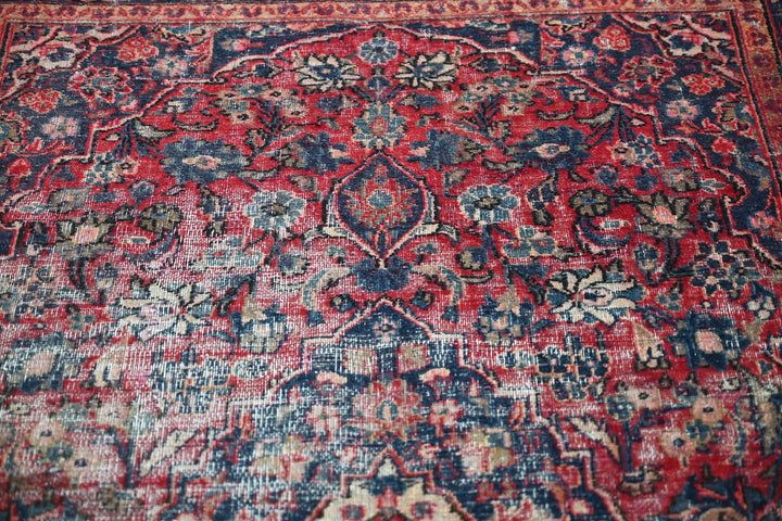 red Accent rug 4' 0" x 6' 5"