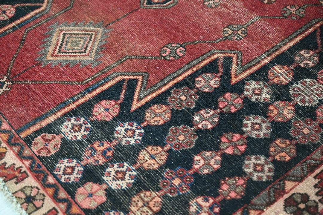 red Accent rug 4' 1" x 6' 2"