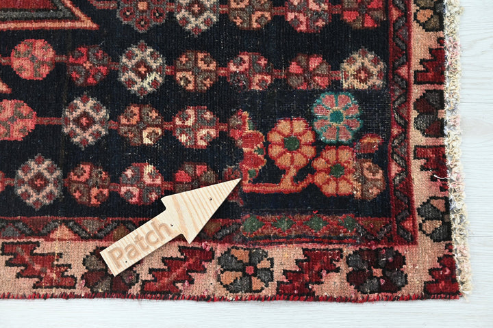 red Accent rug 4' 1" x 6' 2"