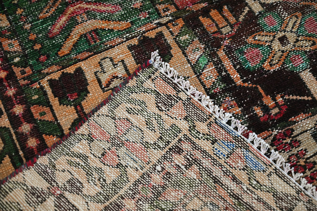 brown Accent rug 3' 10" x 6' 1"