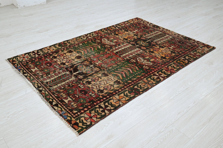 brown Accent rug 3' 10" x 6' 1"