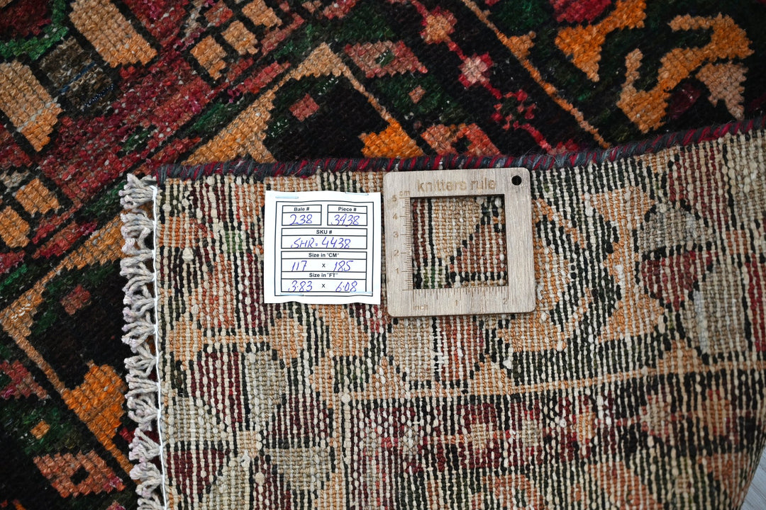 brown Accent rug 3' 10" x 6' 1"