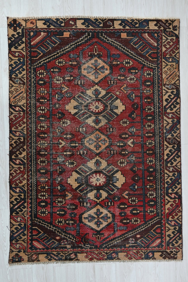 red Accent rug 4' 2" x 6' 2"
