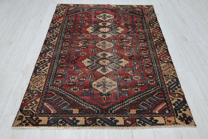 red Accent rug 4' 2" x 6' 2"