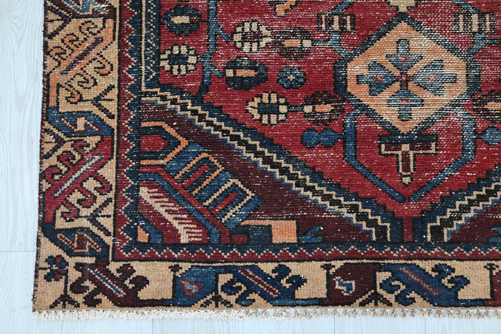 red Accent rug 4' 2" x 6' 2"