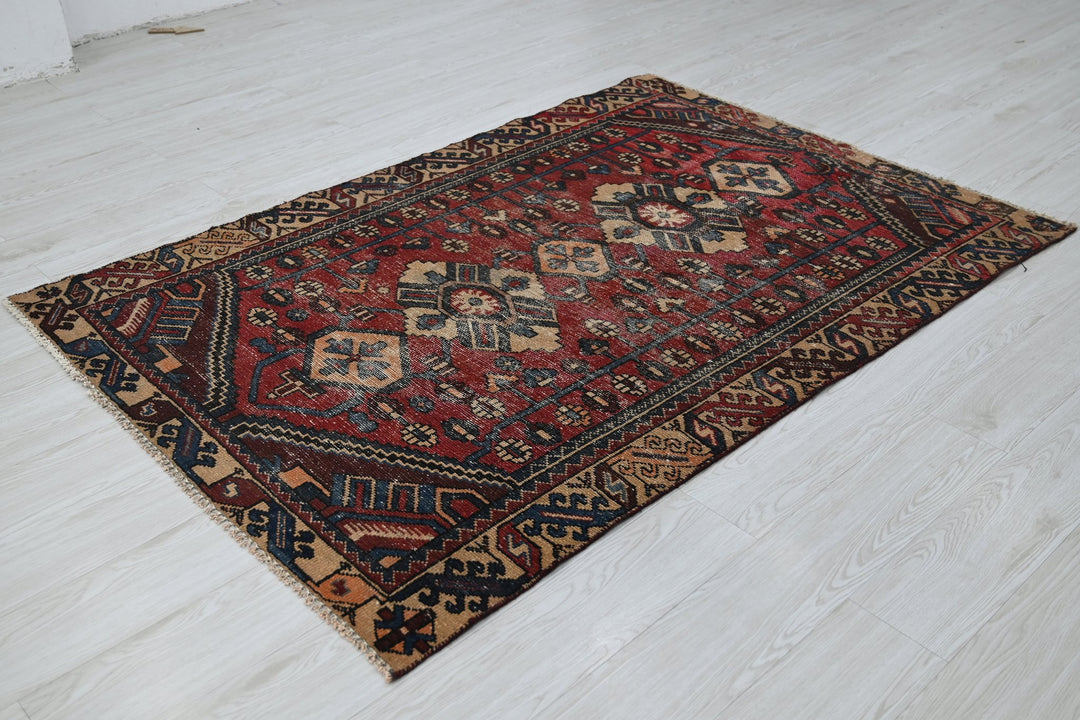 red Accent rug 4' 2" x 6' 2"
