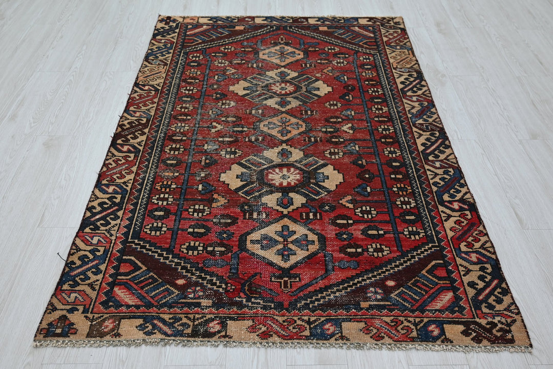 red Accent rug 4' 2" x 6' 2"