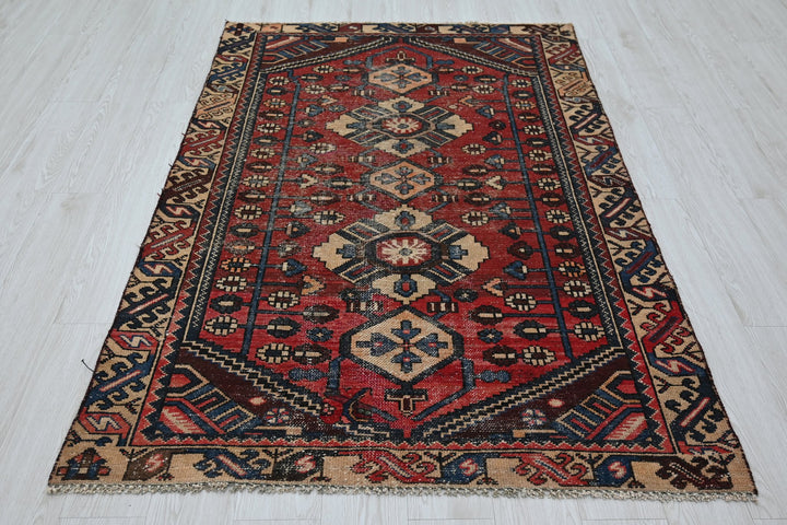 red Accent rug 4' 2" x 6' 2"