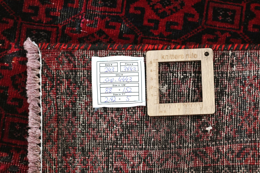 red Accent rug 2' 11" x 5' 0"