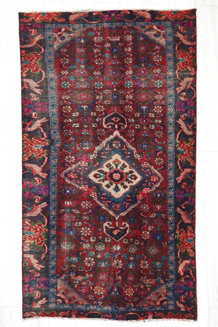 red Accent rug 3' 4" x 6' 0"
