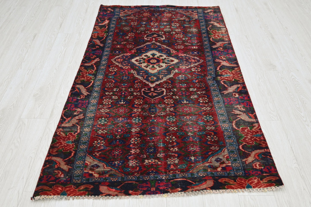 red Accent rug 3' 4" x 6' 0"