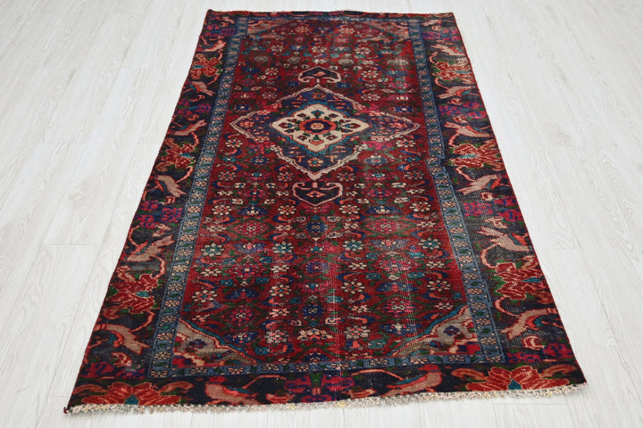 red Accent rug 3' 4" x 6' 0"