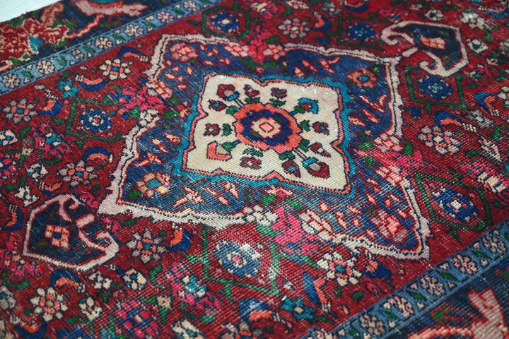 red Accent rug 3' 4" x 6' 0"
