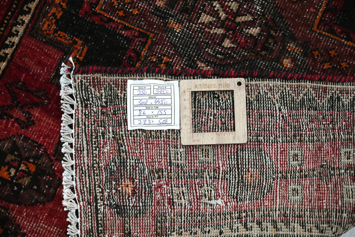 red Accent rug 2' 10" x 5' 1"