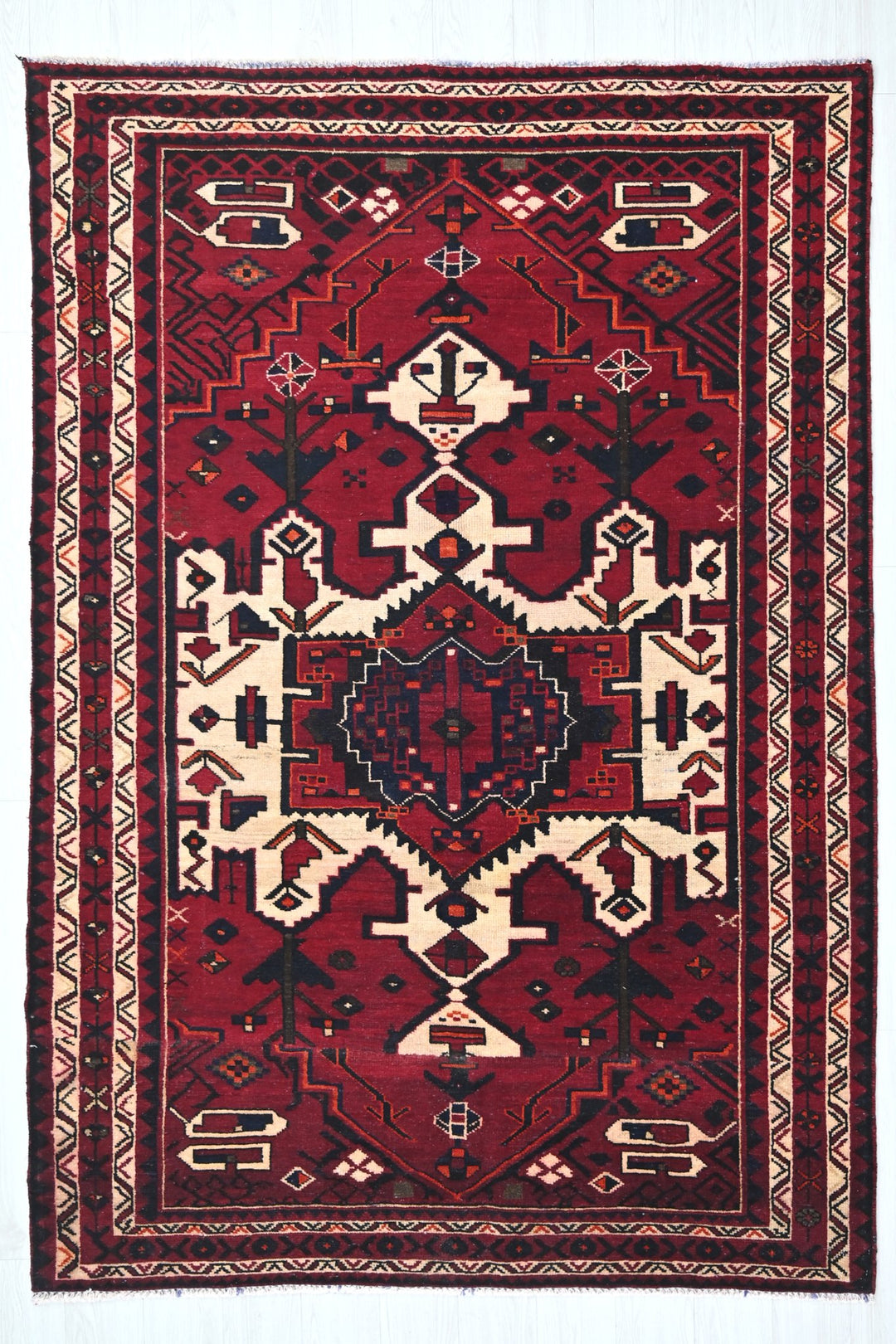 red Medium rug 5' 4" x 7' 10"