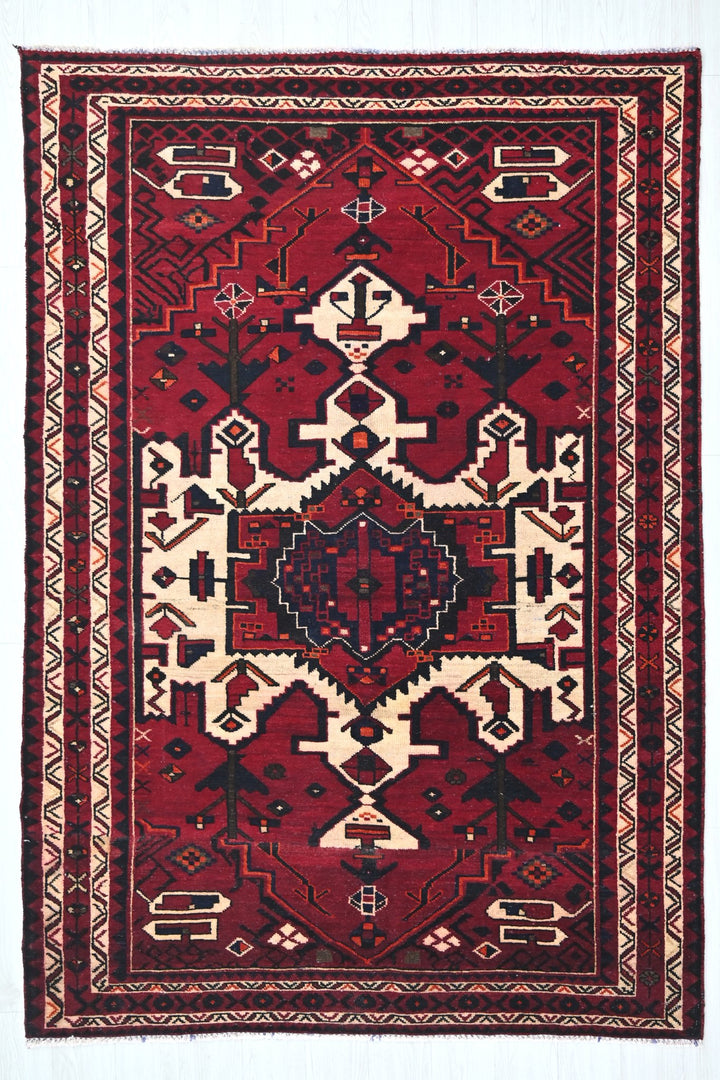 red Medium rug 5' 4" x 7' 10"