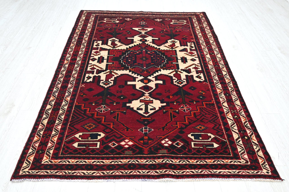 red Medium rug 5' 4" x 7' 10"