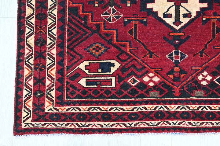 red Medium rug 5' 4" x 7' 10"