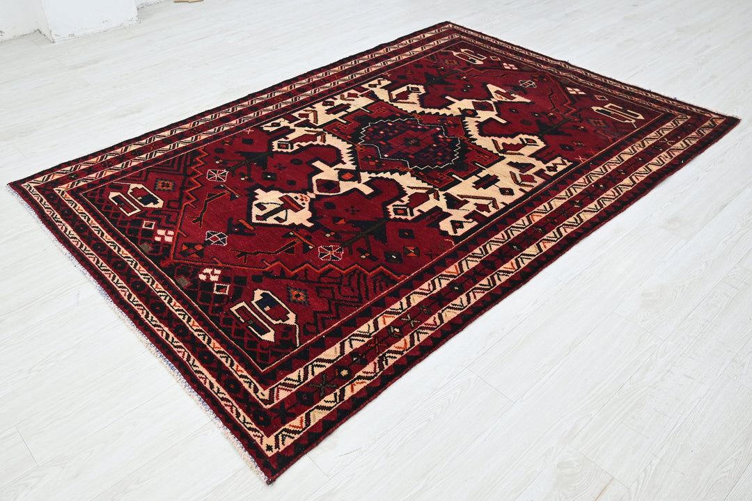 red Medium rug 5' 4" x 7' 10"