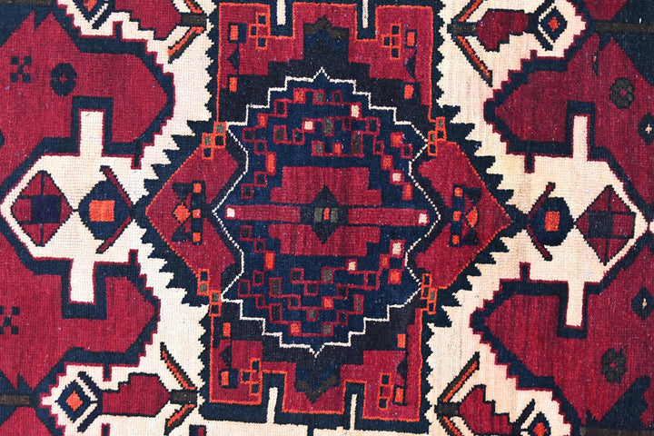 red Medium rug 5' 4" x 7' 10"