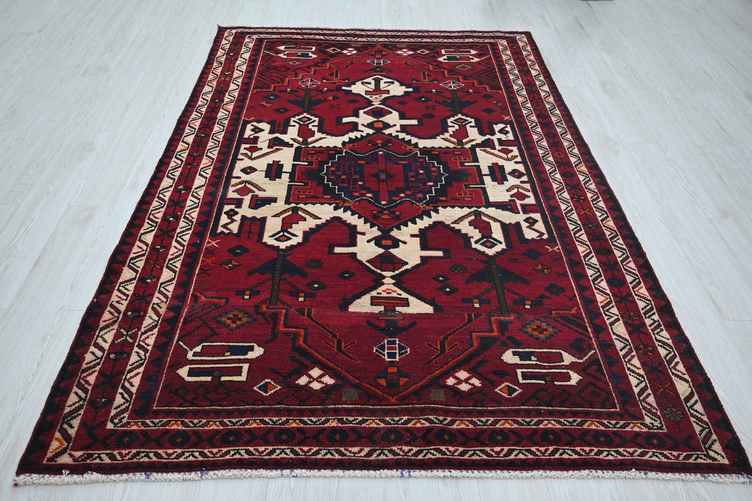 red Medium rug 5' 4" x 7' 10"