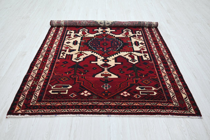 red Medium rug 5' 4" x 7' 10"