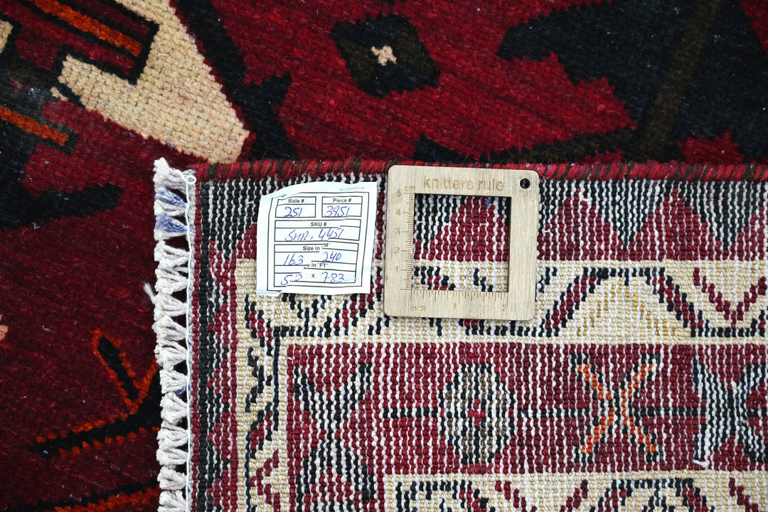 red Medium rug 5' 4" x 7' 10"