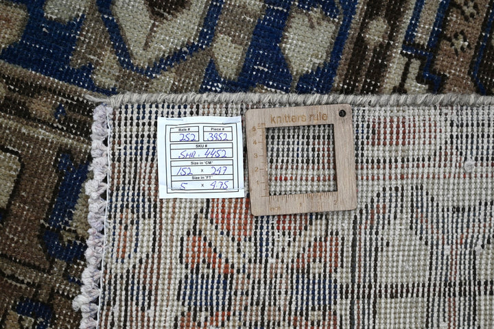 brown Large rug 5' 0" x 9' 9"