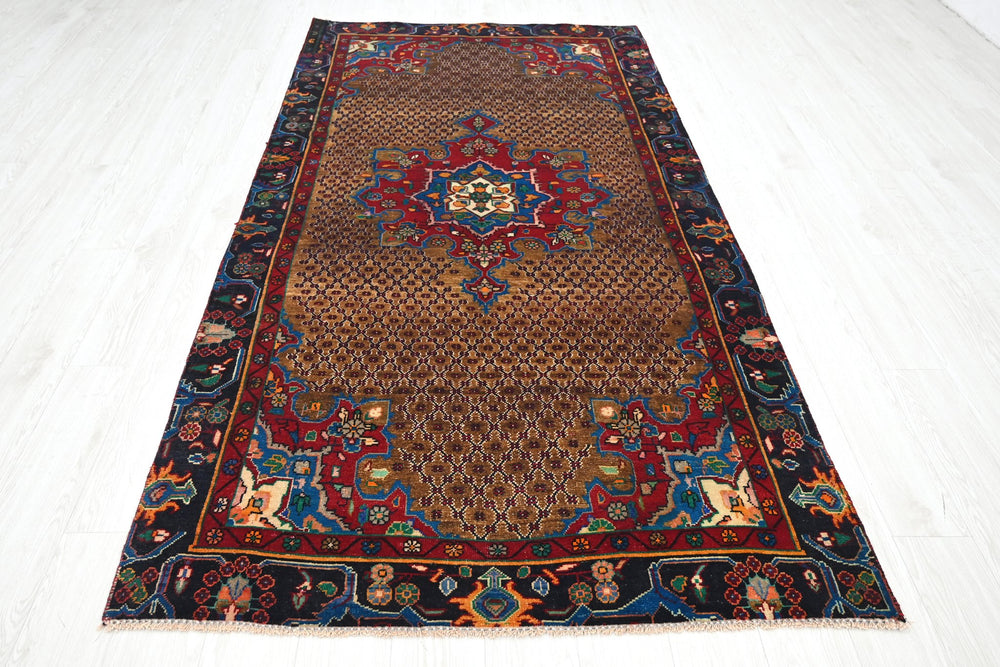 brown Medium rug 4' 6" x 9' 0"