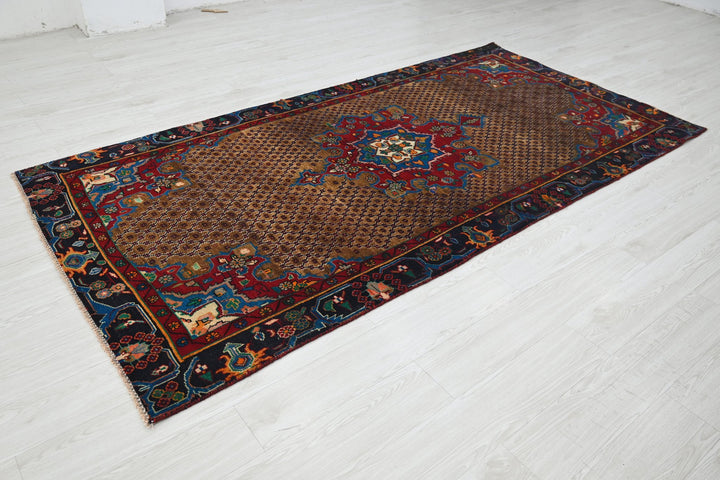 brown Medium rug 4' 6" x 9' 0"