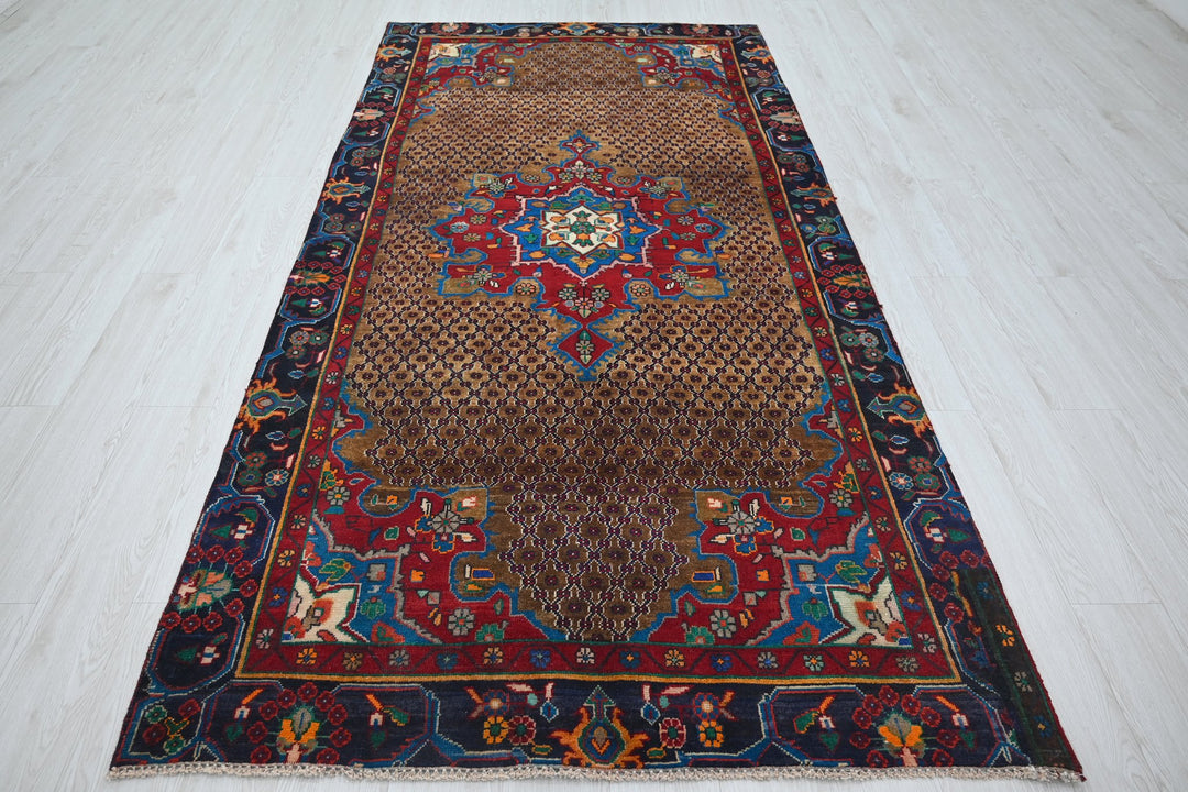 brown Medium rug 4' 6" x 9' 0"