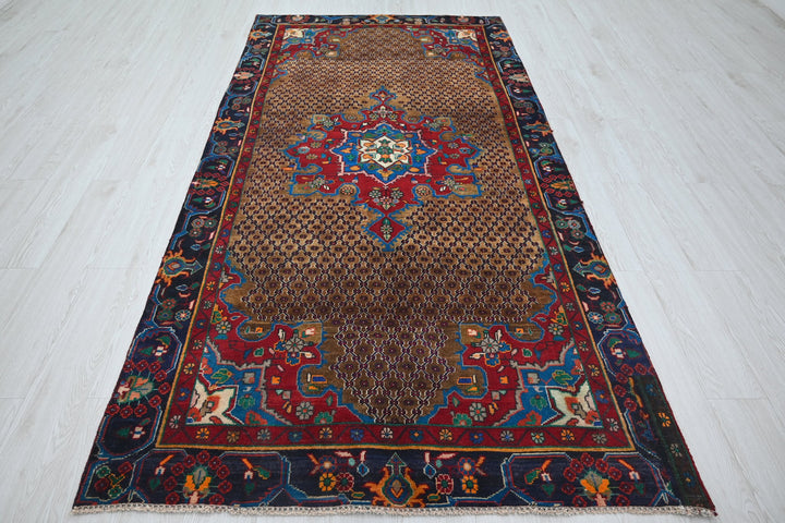 brown Medium rug 4' 6" x 9' 0"