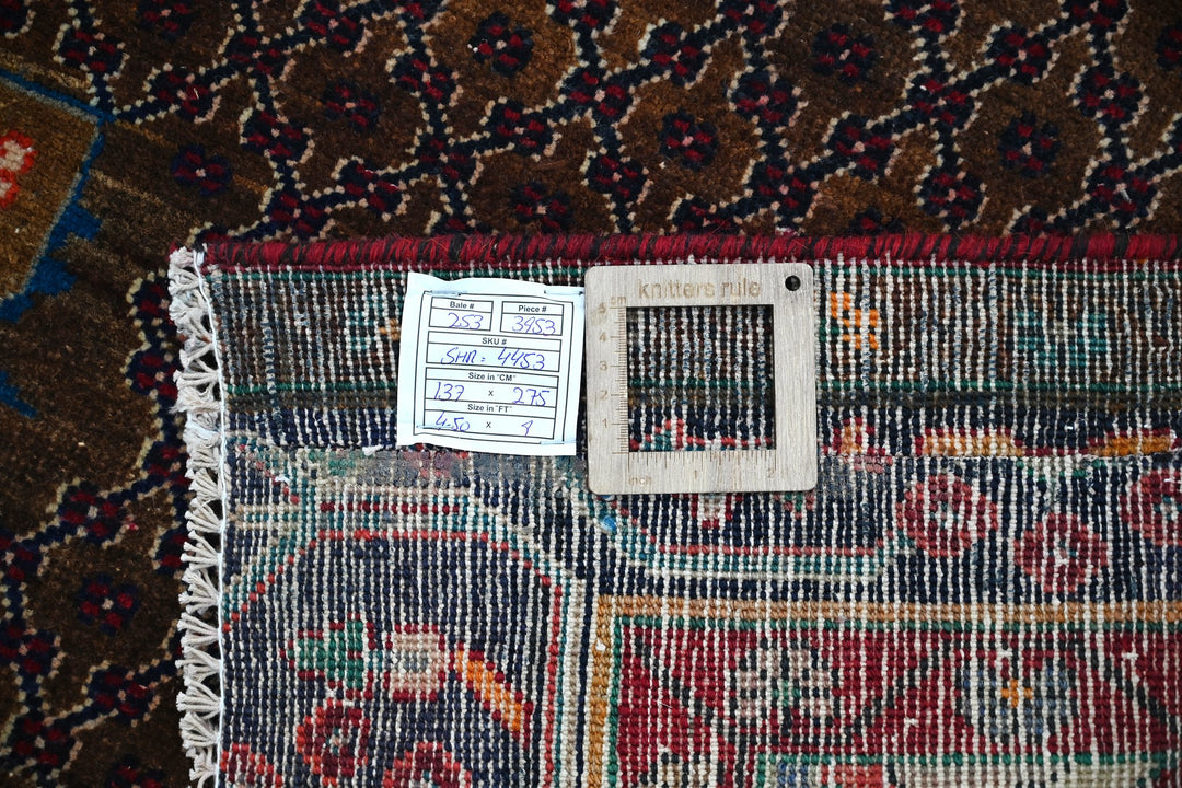 brown Medium rug 4' 6" x 9' 0"