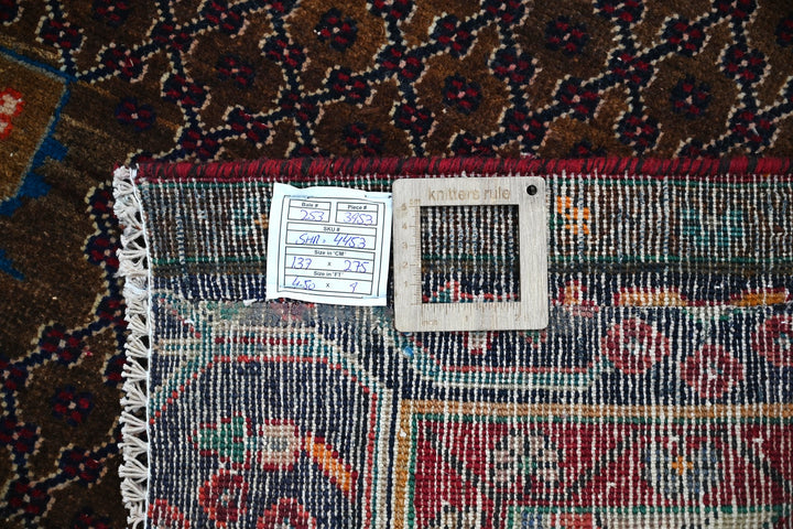 brown Medium rug 4' 6" x 9' 0"