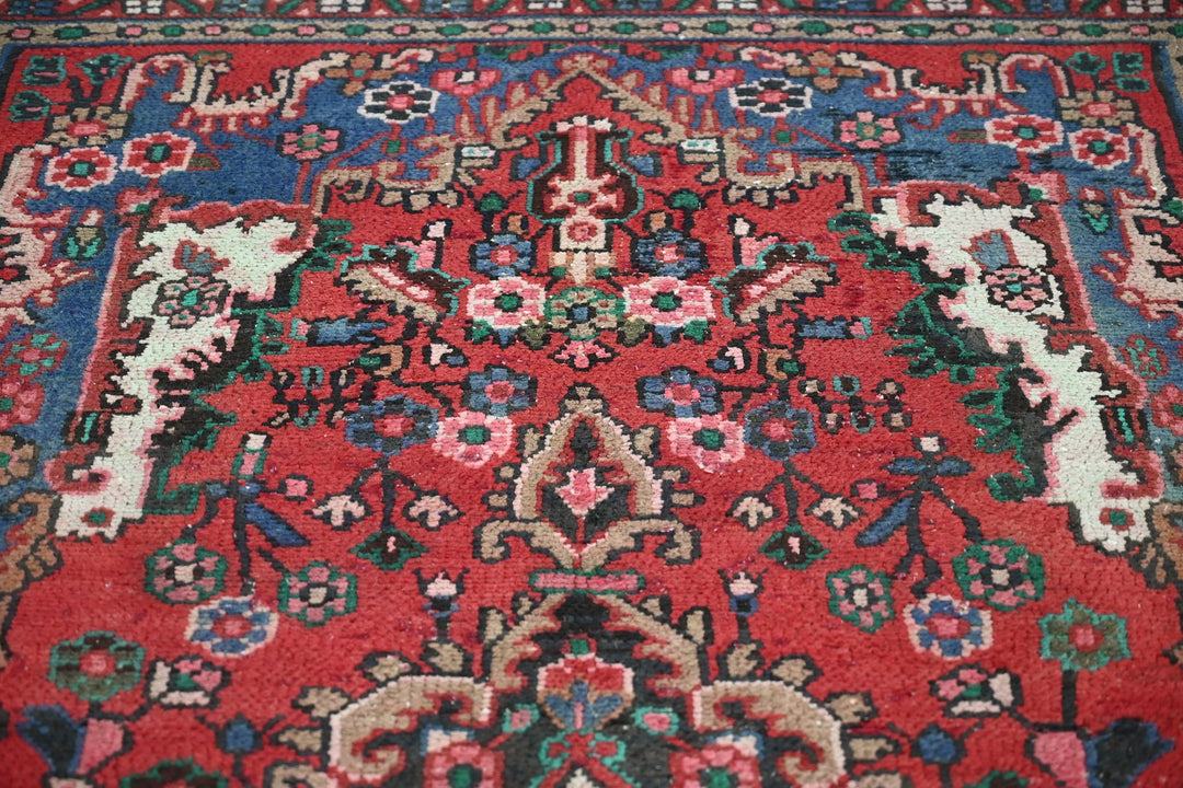 red Medium rug 5' 5" x 9' 4"
