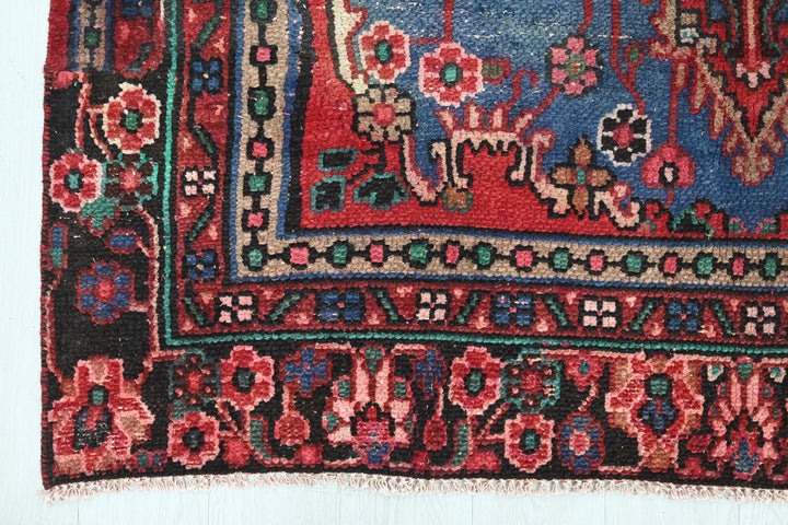 red Medium rug 5' 5" x 9' 4"