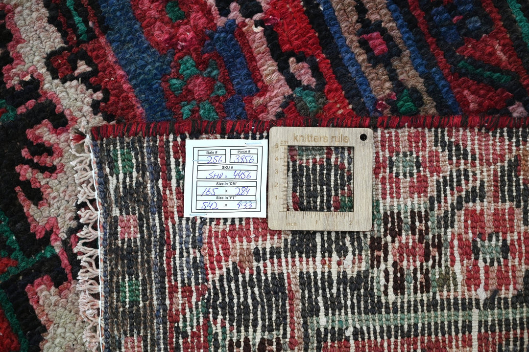 red Medium rug 5' 5" x 9' 4"