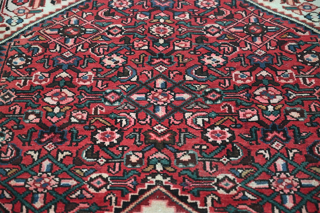 red Large rug 5' 0" x 9' 11"