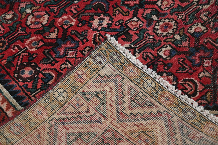 red Large rug 5' 0" x 9' 11"