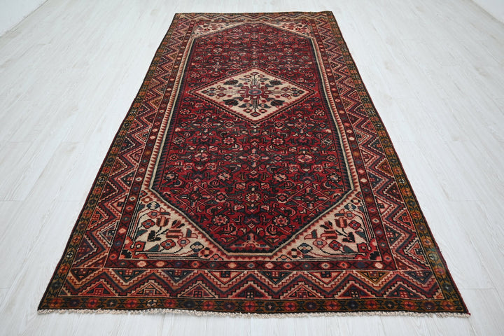red Large rug 5' 0" x 9' 11"