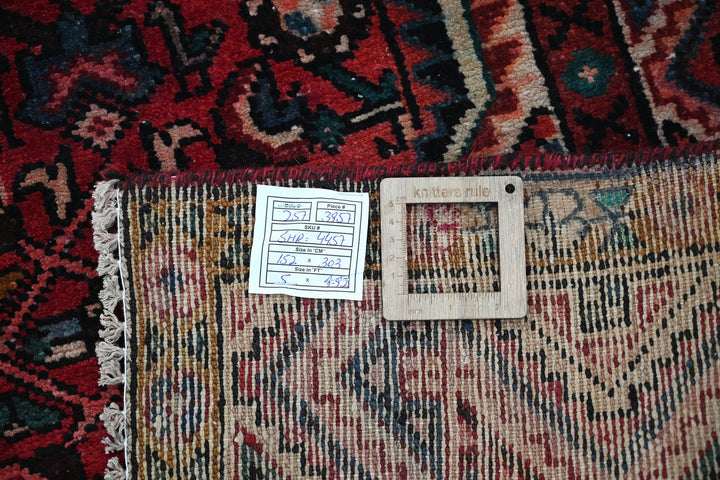 red Large rug 5' 0" x 9' 11"