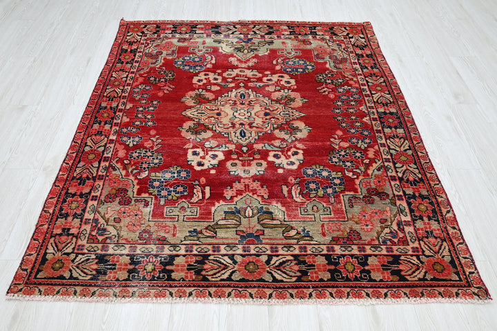 red Medium rug 5' 1" x 6' 5"